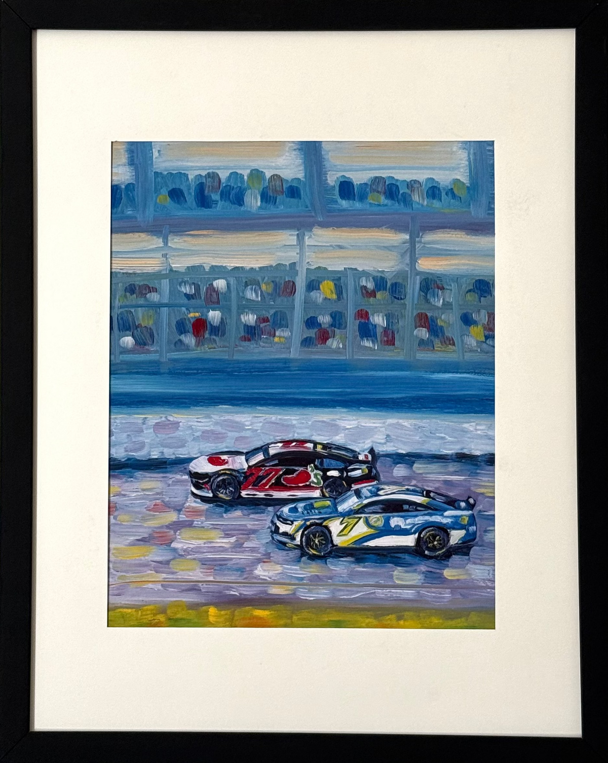 Framed art print of two race cars on a track