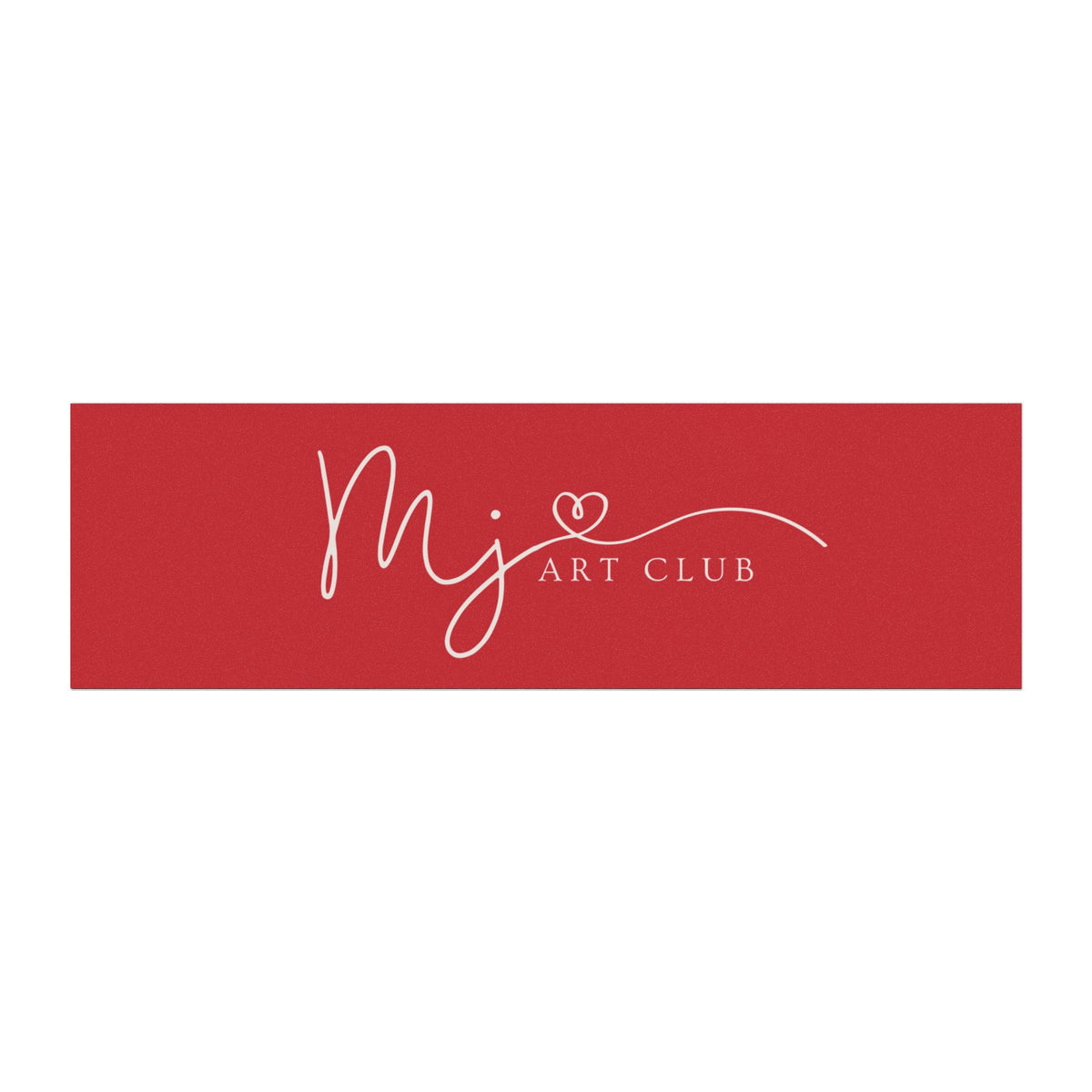A rectangular red sign or banner with white script reading 'mj' and 'ART CLUB' plus a small heart detail, centered on a light gray background.