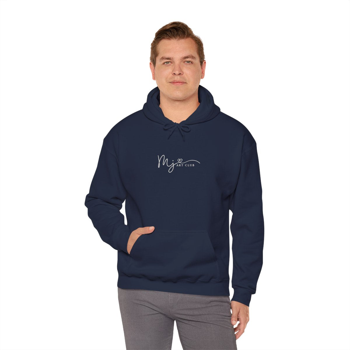 Man wearing a navy blue hoodie with a white logo against a white background