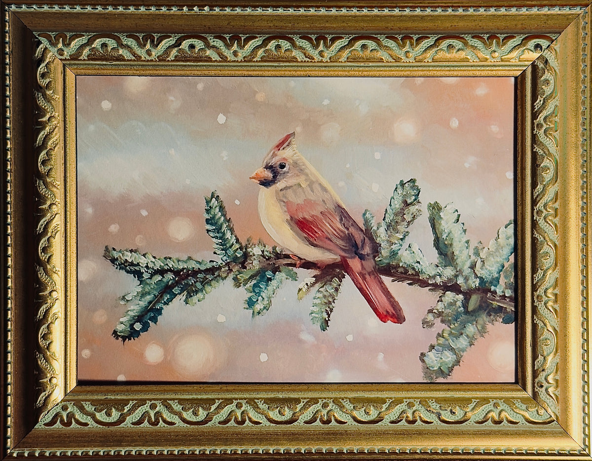 framed art print of a female cardinal sitting on a branch in the snow