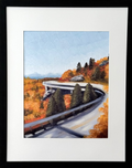 Framed art print of a mountain road featuring fall foliage.